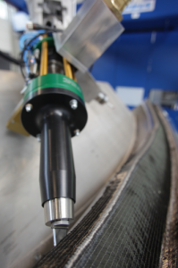 Reis Robotics delivers preform system for carbon fibre composites Reis Robotics delivers preform system for carbon fibre composites