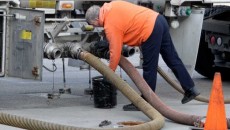 Oil above $105 amid mixed global growth signs