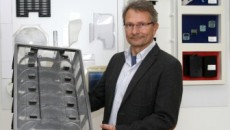 Illig's UA 100g sheet processing machine suited for production of Varioboxx carrier box parts