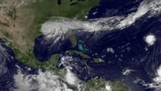 Oil companies recover from Isaac, one refinery flooded