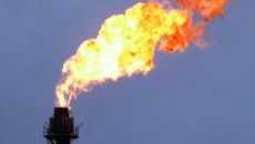 Natural gas drops 2.4 percent with supplies now 61 pct higher than average; oil reclaims $103