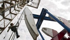 Oil hits 8-month low as Spain bailout hopes fade